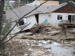 Home damaged by flooding in Jamestown, Colo., in 2013