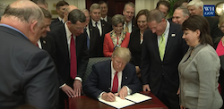 President Donald Trump signing an executive order on the Waters of the United States rule on February 28, 2017. Photo: White House